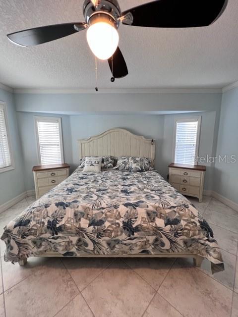 681 Verona Street Port Charlotte, FL 33948 - Photo 31 of 40 a bedroom with a bed and window