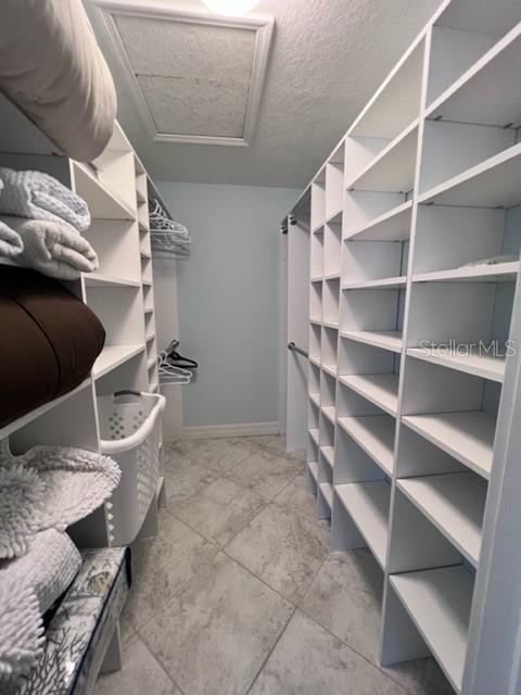 681 Verona Street Port Charlotte, FL 33948 - Photo 32 of 40 a living room with furniture and a painting