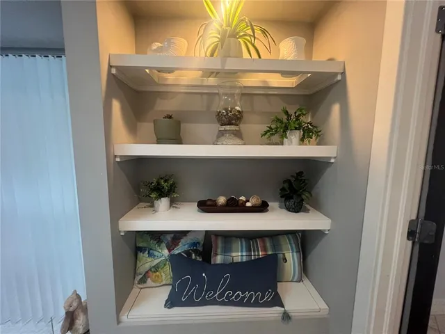 a table with a vase of flowers on it