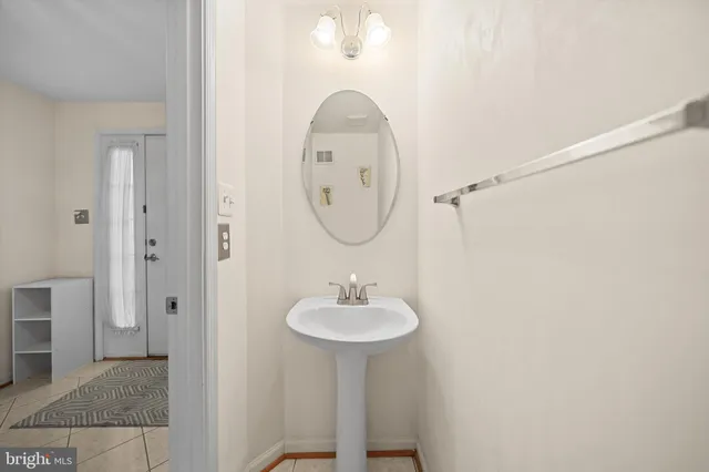 a view of balcony with wooden floor and outdoor seating