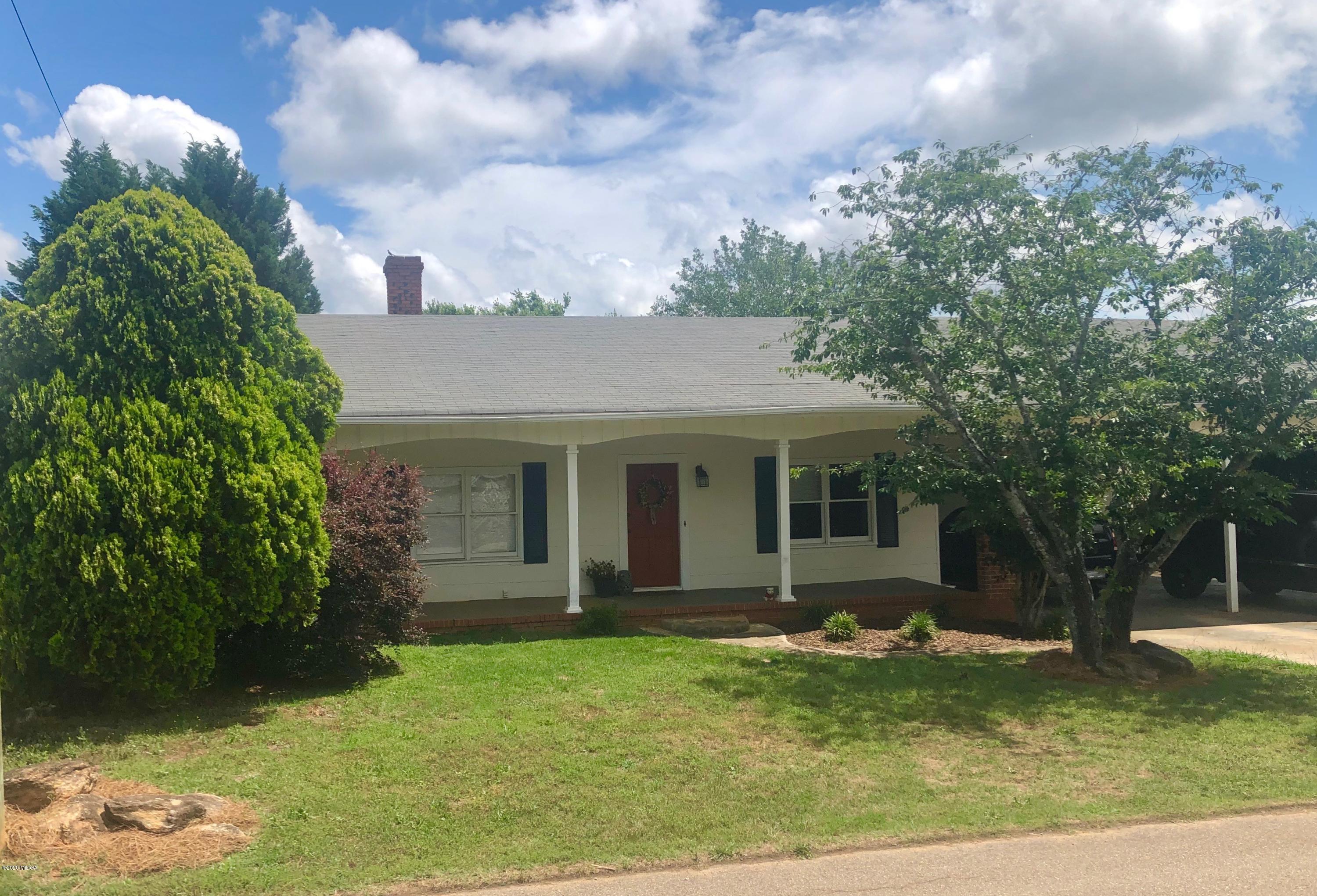 35 Gose Road Forsyth, GA 31029 - Photo 1 of 16 a view of a house with a backyard