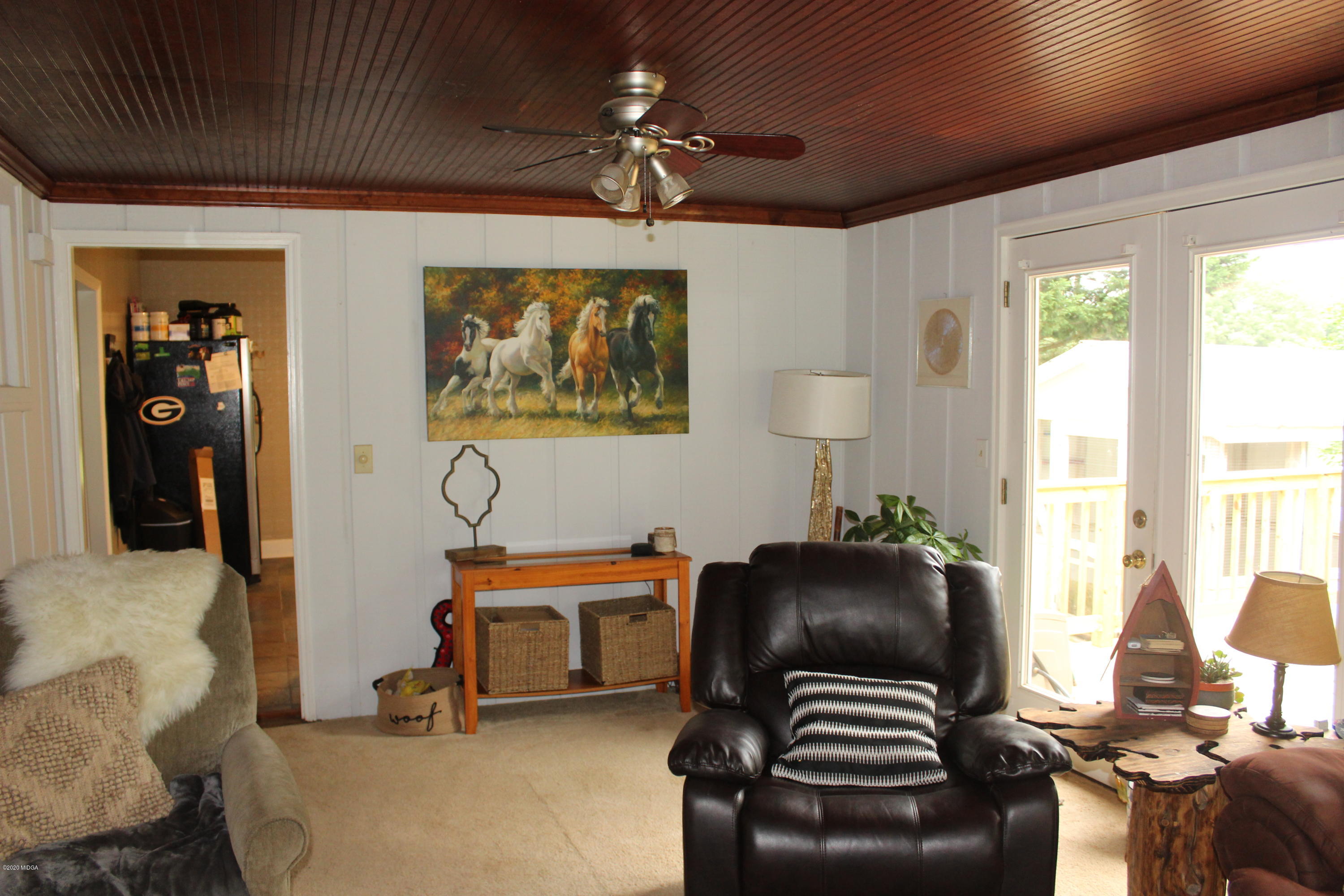 35 Gose Road Forsyth, GA 31029 - Photo 11 of 16 a room with furniture and a chandelier