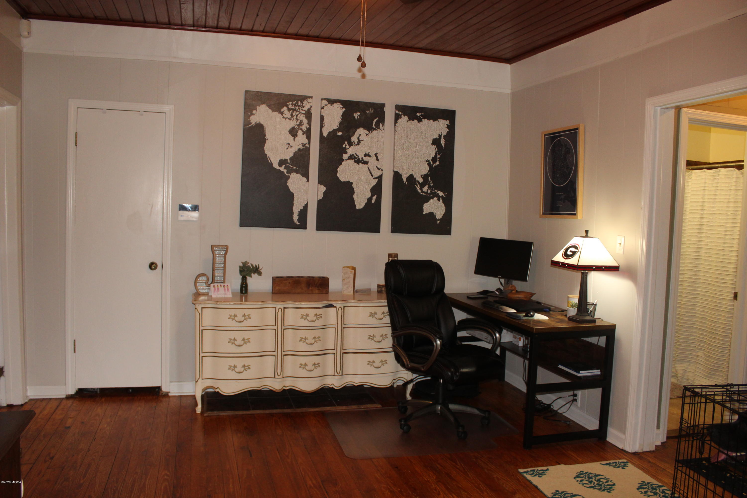 35 Gose Road Forsyth, GA 31029 - Photo 12 of 16 a view of a workspace with furniture and wooden floor