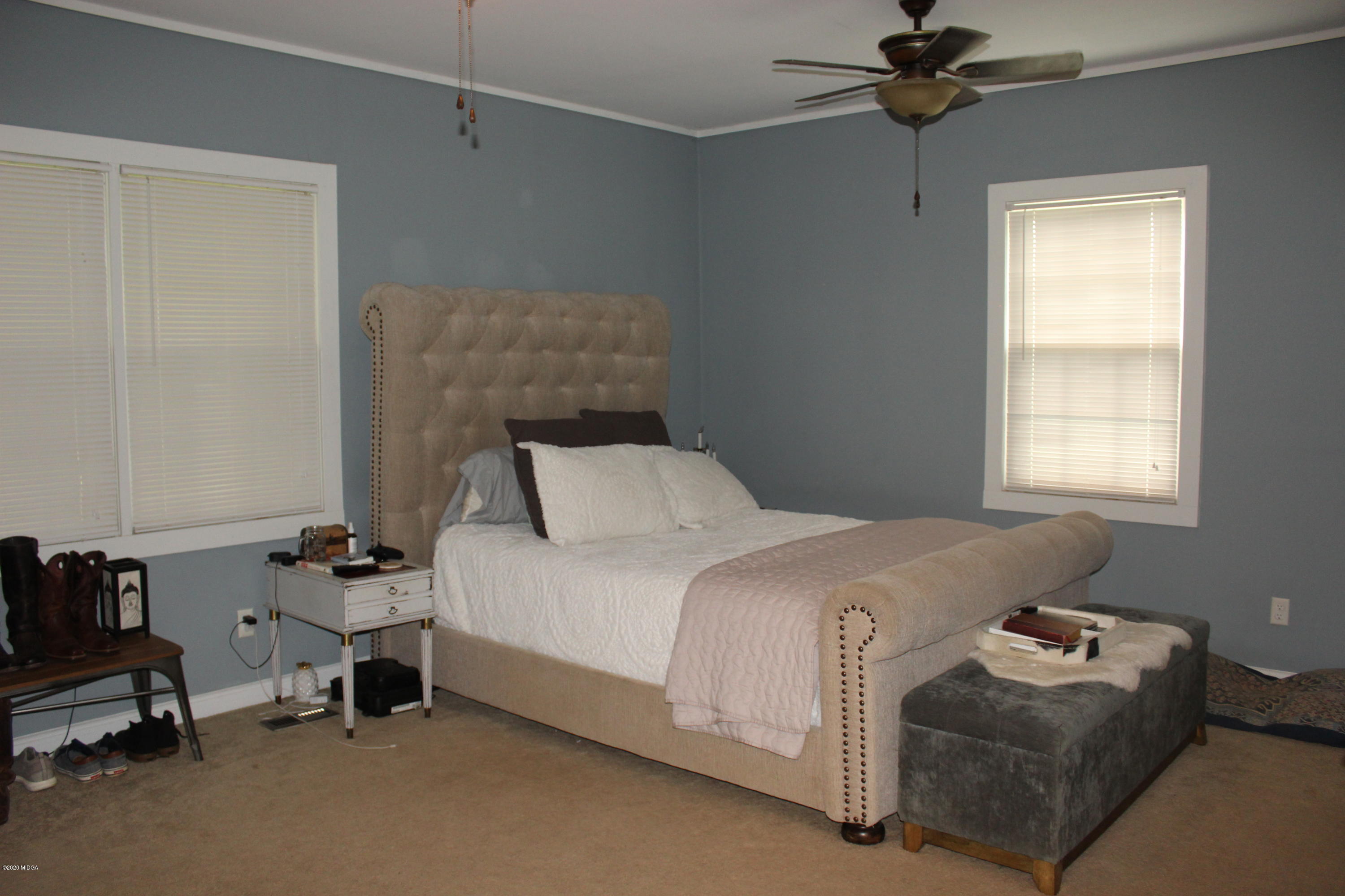35 Gose Road Forsyth, GA 31029 - Photo 13 of 16 a bedroom with a bed and a window