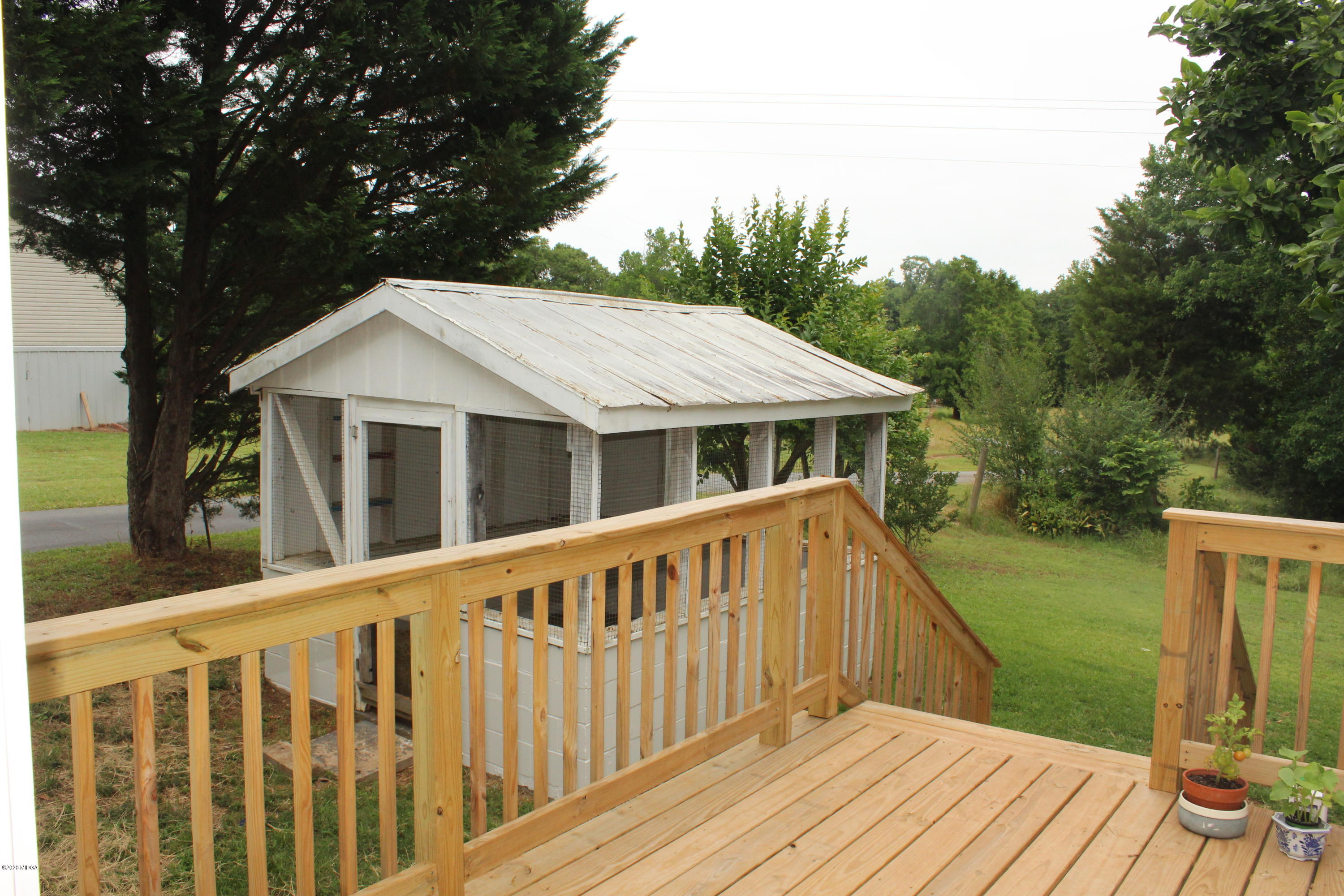 35 Gose Road Forsyth, GA 31029 - Photo 15 of 16 a view of a house with a deck