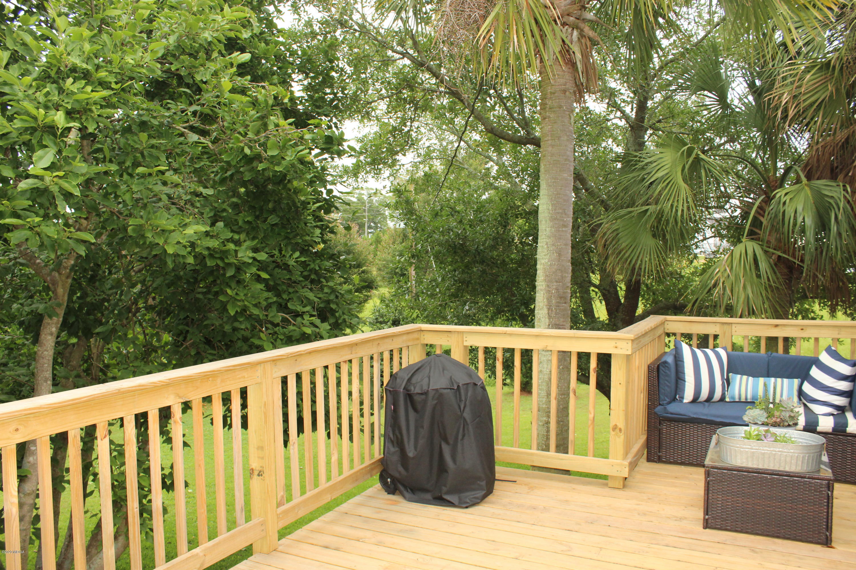 35 Gose Road Forsyth, GA 31029 - Photo 16 of 16 a view of roof deck with furniture