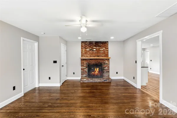 a view of a livingroom with wooden floor