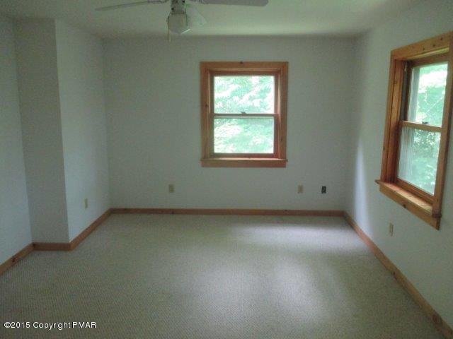 1323 Millcreek Road Newfoundland, PA 18445 - Photo 15 of 18 an empty room with a window