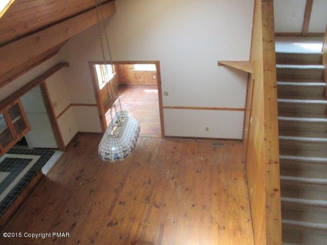 1323 Millcreek Road Newfoundland, PA 18445 - Photo 7 of 18 a view of entryway with wooden floor