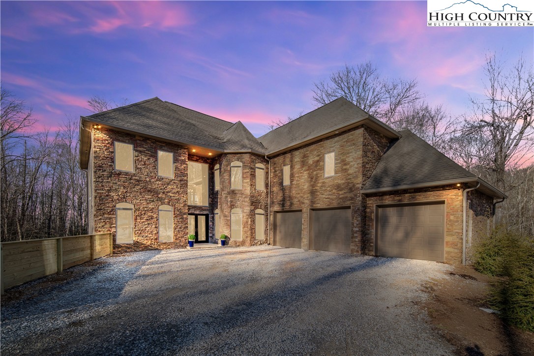 216 Greenbriar Road Beech Mountain, NC 28604 - Photo 2 of 50 a view of a house with a street