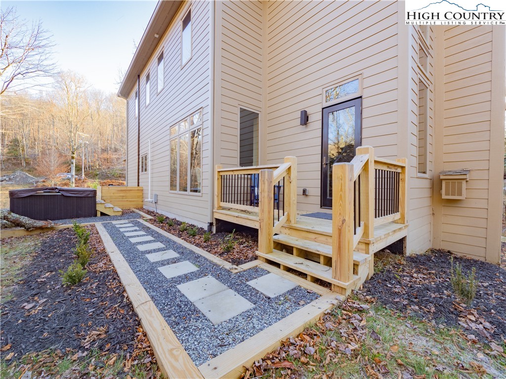 216 Greenbriar Road Beech Mountain, NC 28604 - Photo 30 of 50 a view of a back yard of the house