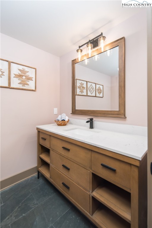 216 Greenbriar Road Beech Mountain, NC 28604 - Photo 32 of 50 a bathroom with a sink and a mirror
