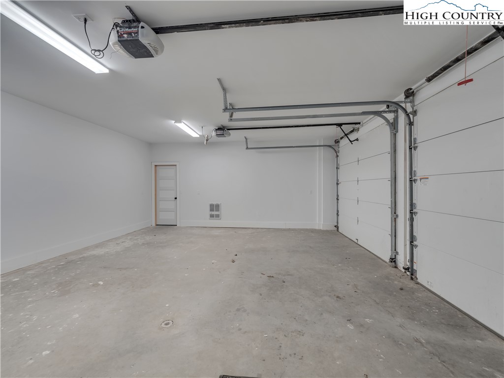 216 Greenbriar Road Beech Mountain, NC 28604 - Photo 48 of 50 a view of a room with an empty space