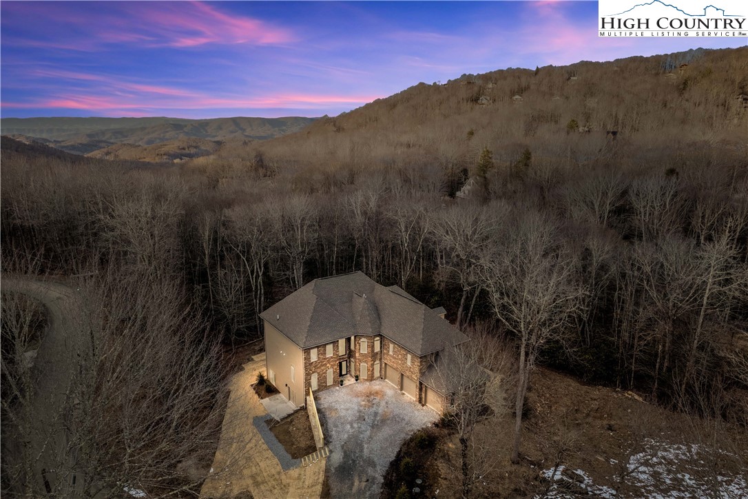 216 Greenbriar Road Beech Mountain, NC 28604 - Photo 9 of 50 a view of a back yard