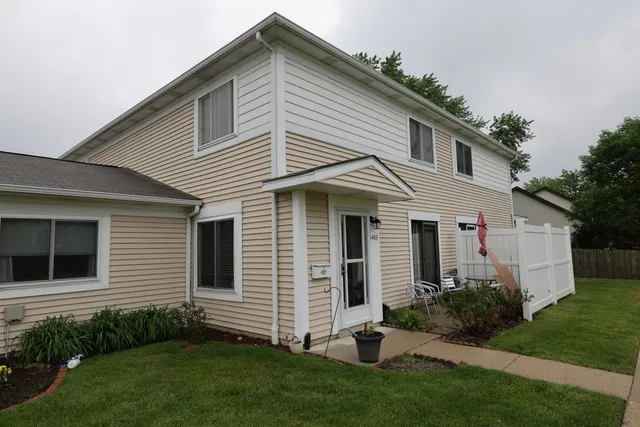 a front view of house with yard