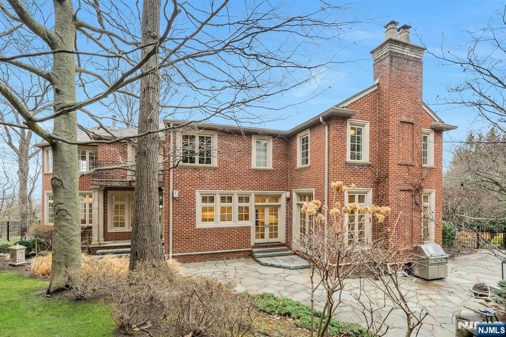 125 Jackson Drive Cresskill, NJ 07626 - Photo 38 of 46 a front view of a house with a yard