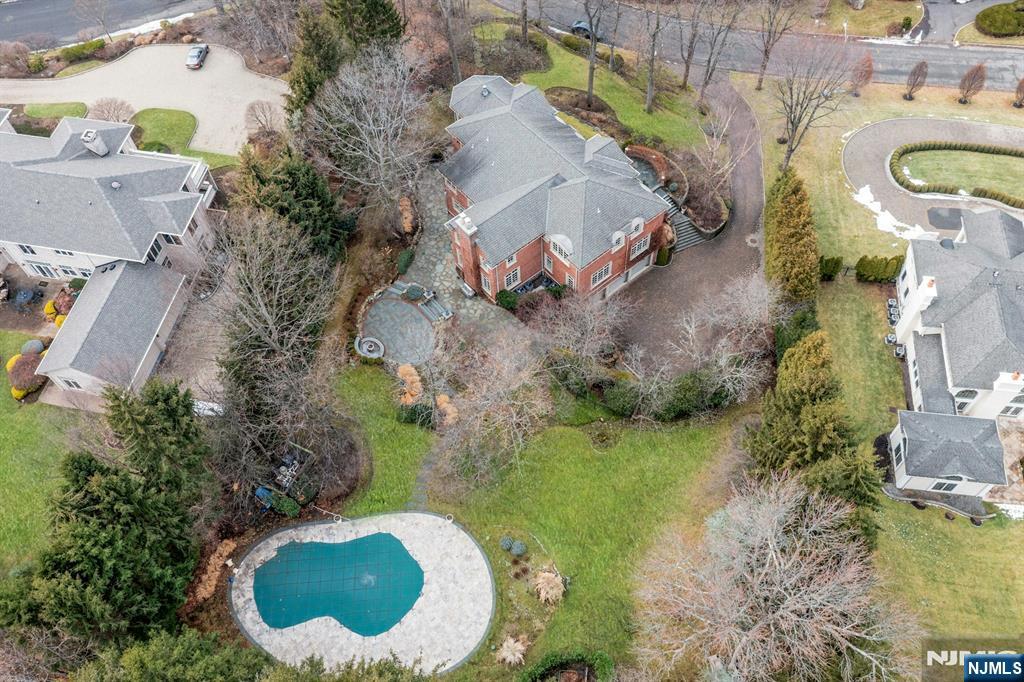 125 Jackson Drive Cresskill, NJ 07626 - Photo 45 of 46 an aerial view of a house with a swimming pool