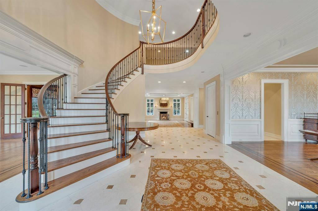 125 Jackson Drive Cresskill, NJ 07626 - Photo 5 of 46 a view of entryway and hall with wooden floor