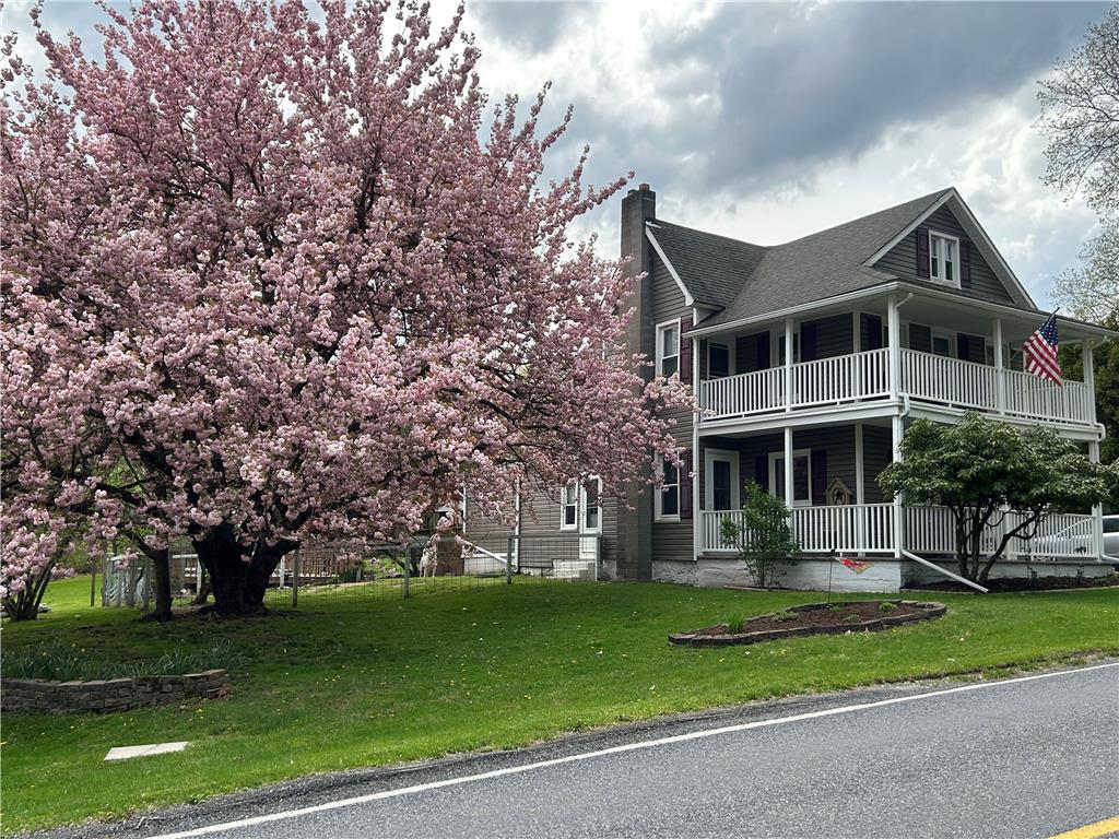 1114 Fox Gap Road Bangor, PA 18013 - Photo 47 of 63 Double-decker porches grace the exterior of this classic multi-level residence.