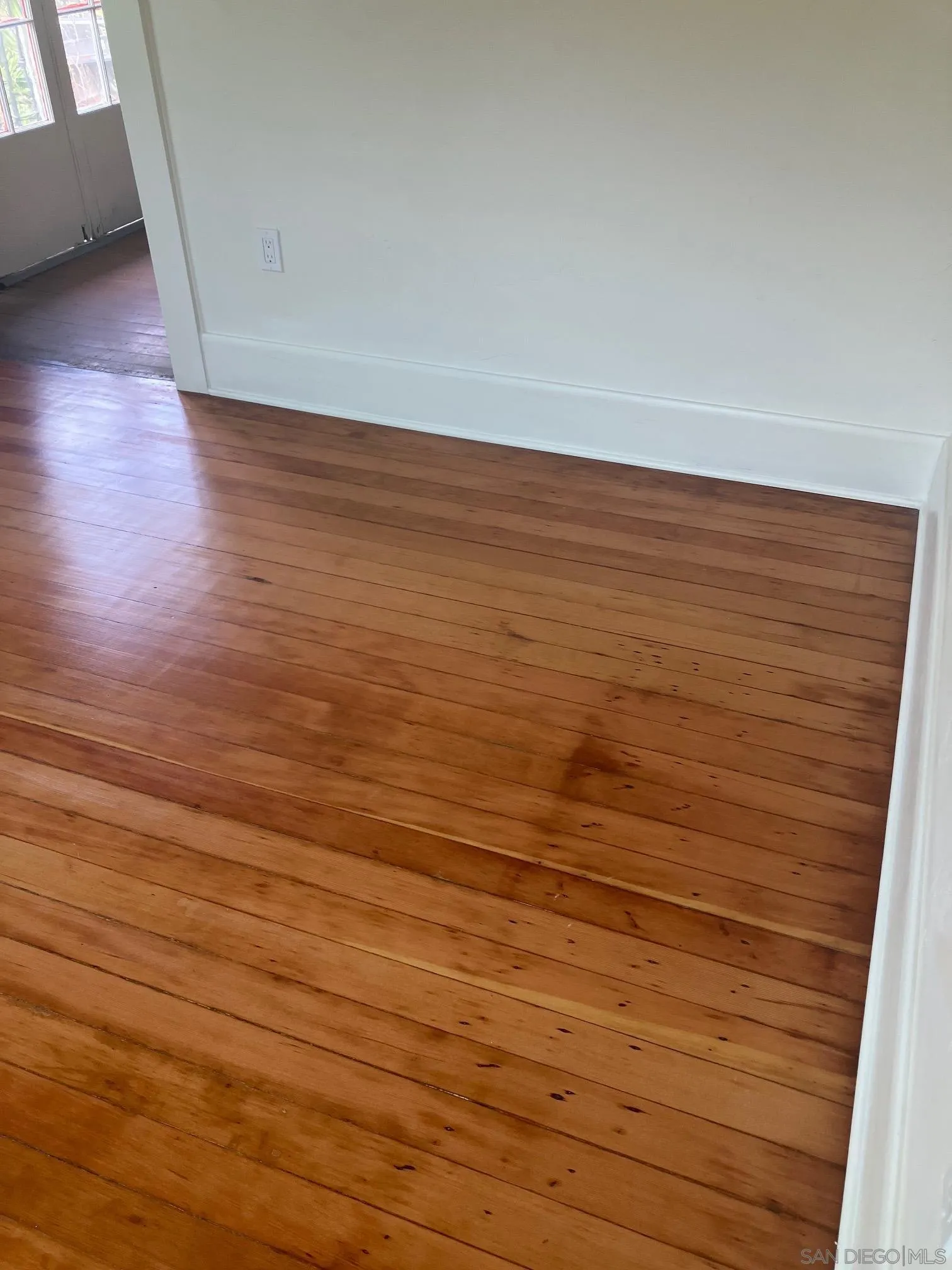 3965 Normal Street San Diego, CA 92103 - Photo 4 of 4 a view of room with wooden floor