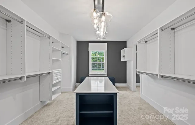 a view of entryway with window and hallway