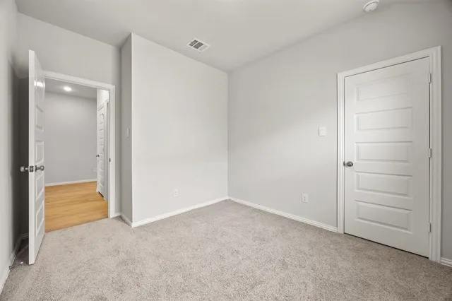 wooden floor and closet in a room