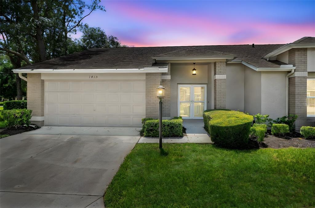 a view of a back yard of the house