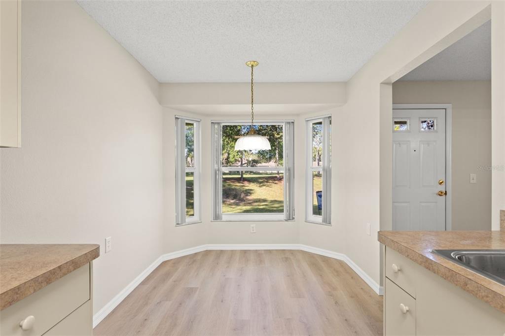 1415 Pinewood Hills Court Spring Hill, FL 34606 - Photo 21 of 45 a view of an empty room with window and cabinet