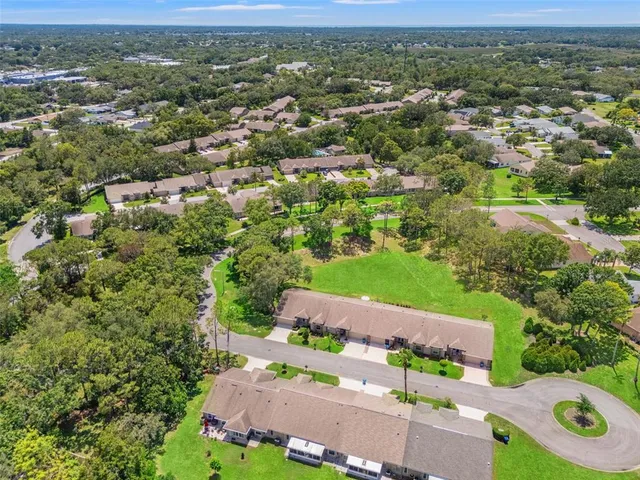 an aerial view of a city with lots of residential buildings