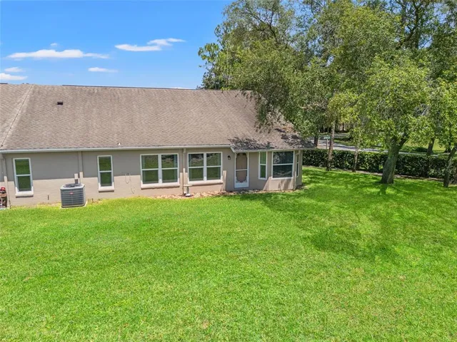 a front view of a house with a garden and porch