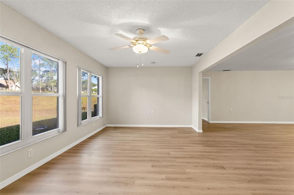 1415 Pinewood Hills Court Spring Hill, FL 34606 - Photo 10 of 45 a view of an empty room with a window