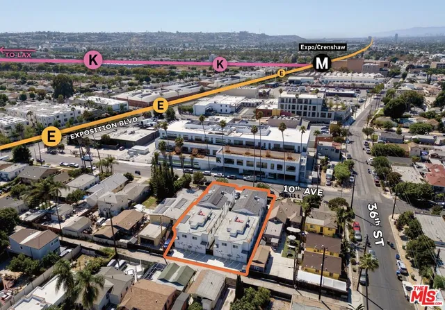 an aerial view of a city with lots of residential buildings