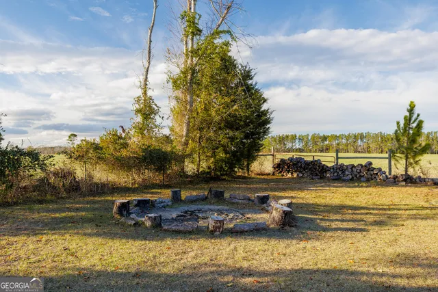 a view of a swimming pool with an outdoor space