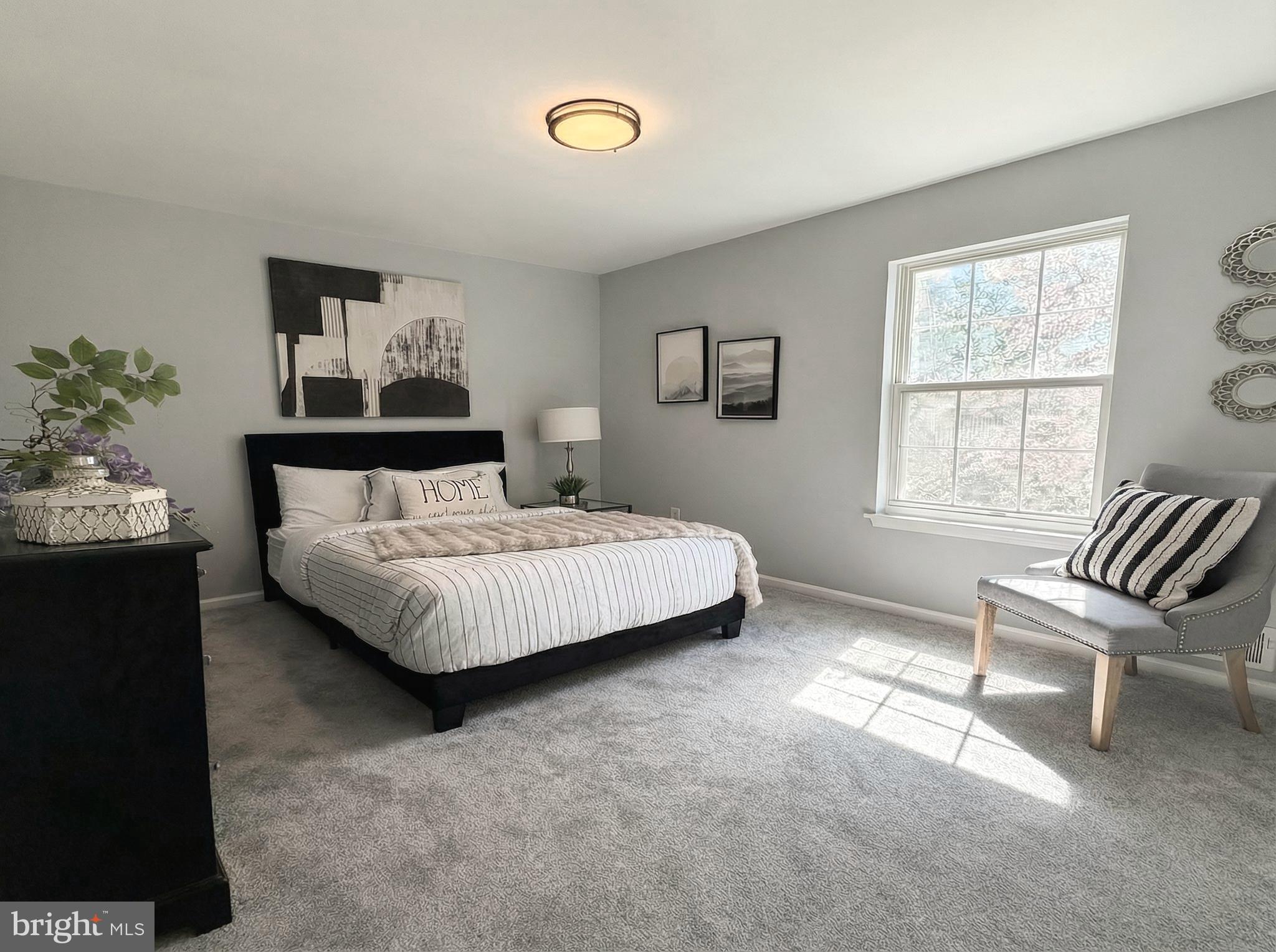 205 Castleton Court Pennington, NJ 08534 - Photo 14 of 26 a bedroom with a bed and a window