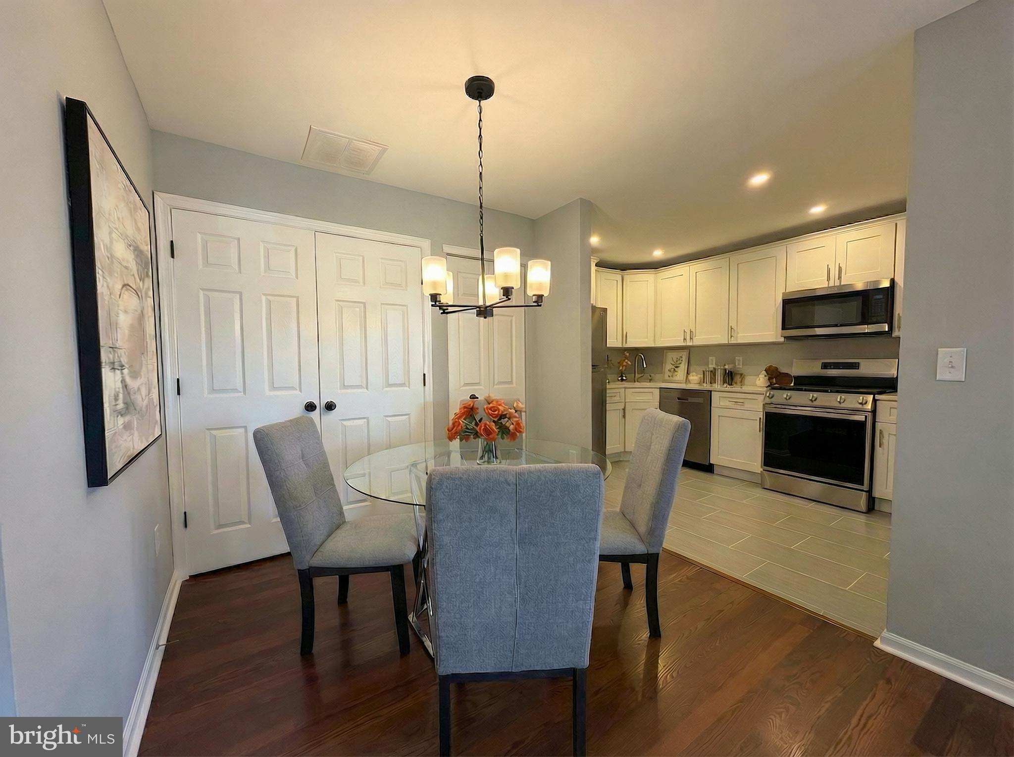 205 Castleton Court Pennington, NJ 08534 - Photo 7 of 26 a view of kitchen with dining table and chairs