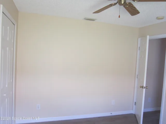 a view of small space with wooden floor