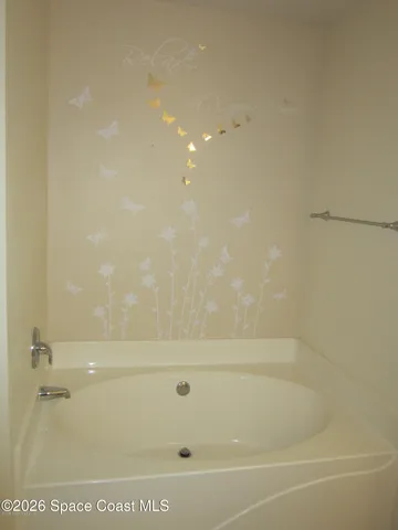 a bathroom with a bathtub