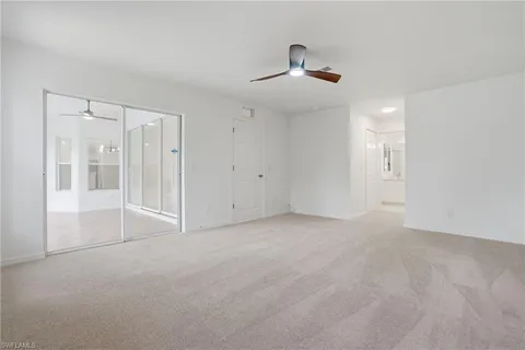 an empty room with fan