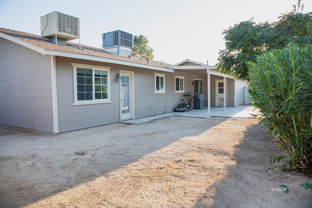 620 Heather Court Ridgecrest, CA 93555 - Photo 24 of 26 a view of a house with a sink and yard