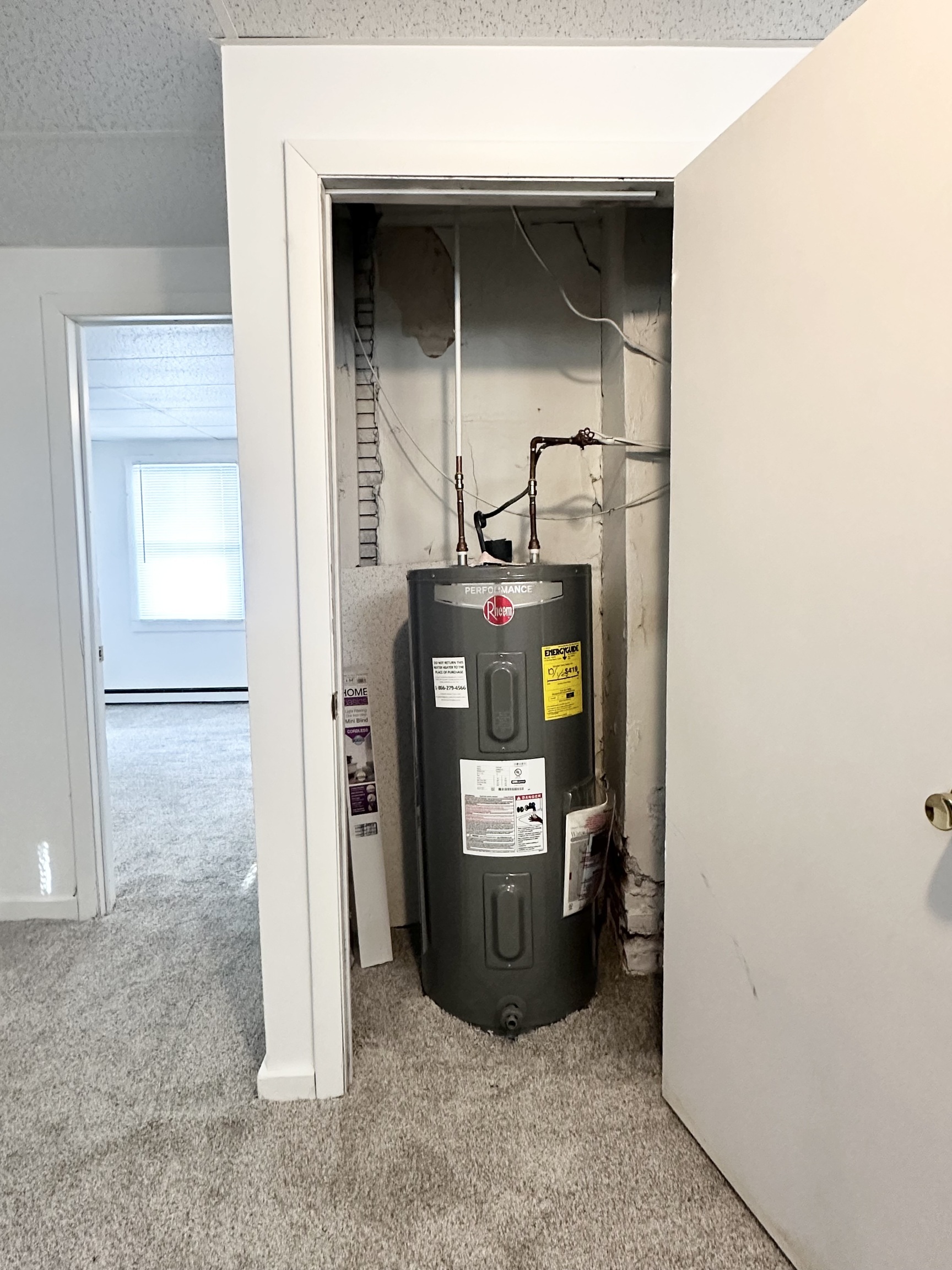 123 High Street Sprague, CT 06330 - Photo 10 of 11 a view of water heater room