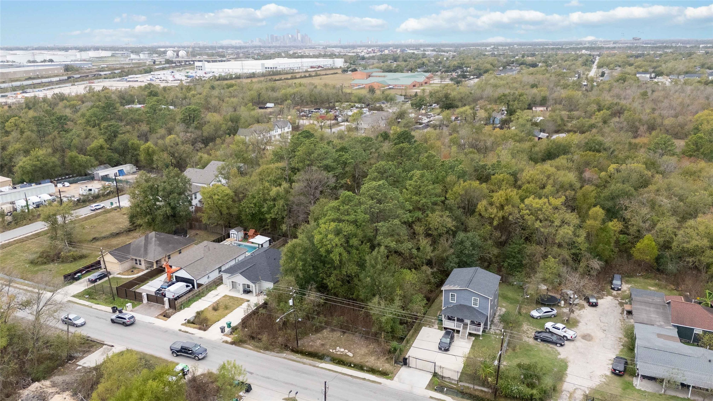 5423 East Houston Road Houston, TX 77028 - Photo 4 of 8 an aerial view of residential houses with outdoor space