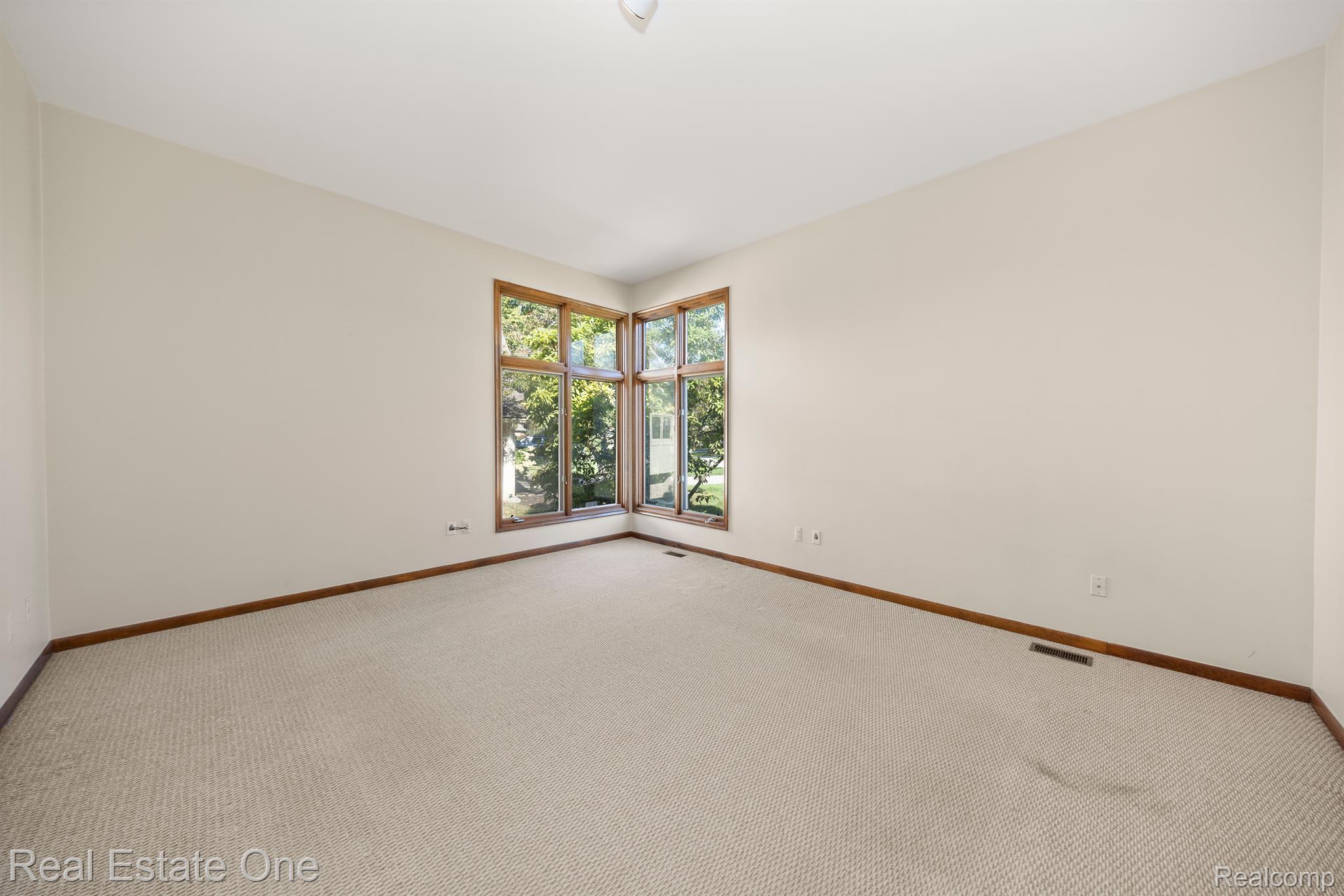 30971 Country Ridge Circle Farmington, MI 48331 - Photo 19 of 47 LIBRARY/SITTING AREA WITH WINDOWS & HIGH CEILINGS