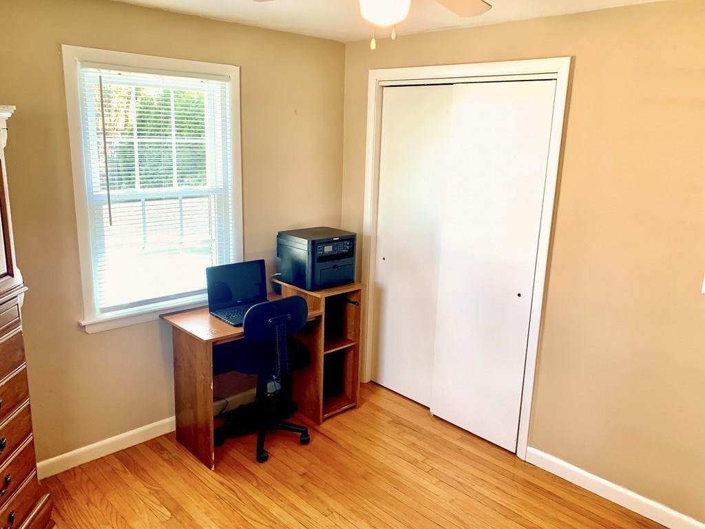 411 Dwight Road East Longmeadow, MA 01028 - Photo 17 of 34 a view of a workspace with furniture and a window