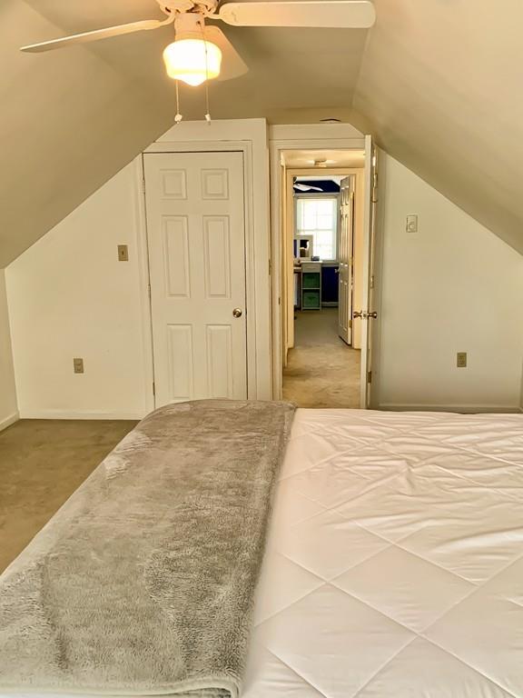 411 Dwight Road East Longmeadow, MA 01028 - Photo 22 of 34 a bedroom with a bed and a chandelier