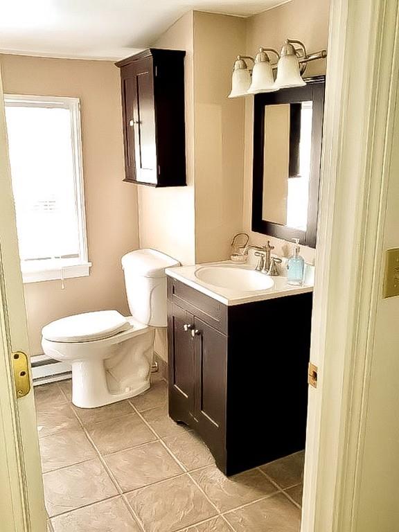 411 Dwight Road East Longmeadow, MA 01028 - Photo 23 of 34 a bathroom with a sink toilet and mirror