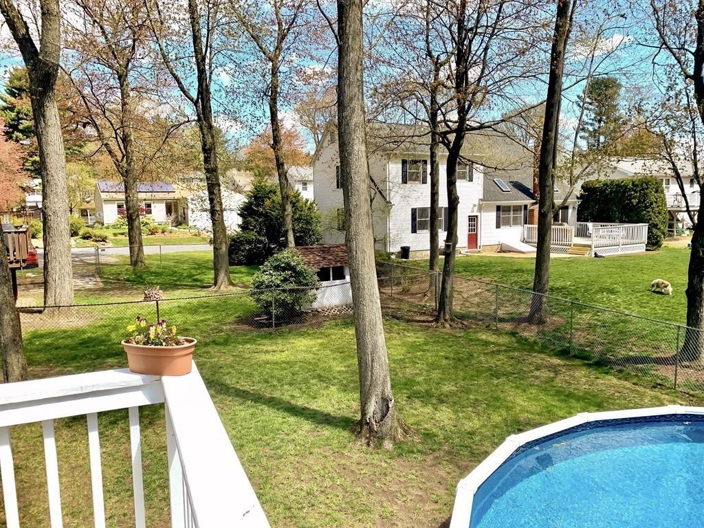 411 Dwight Road East Longmeadow, MA 01028 - Photo 30 of 34 a backyard of a house with lots of green space