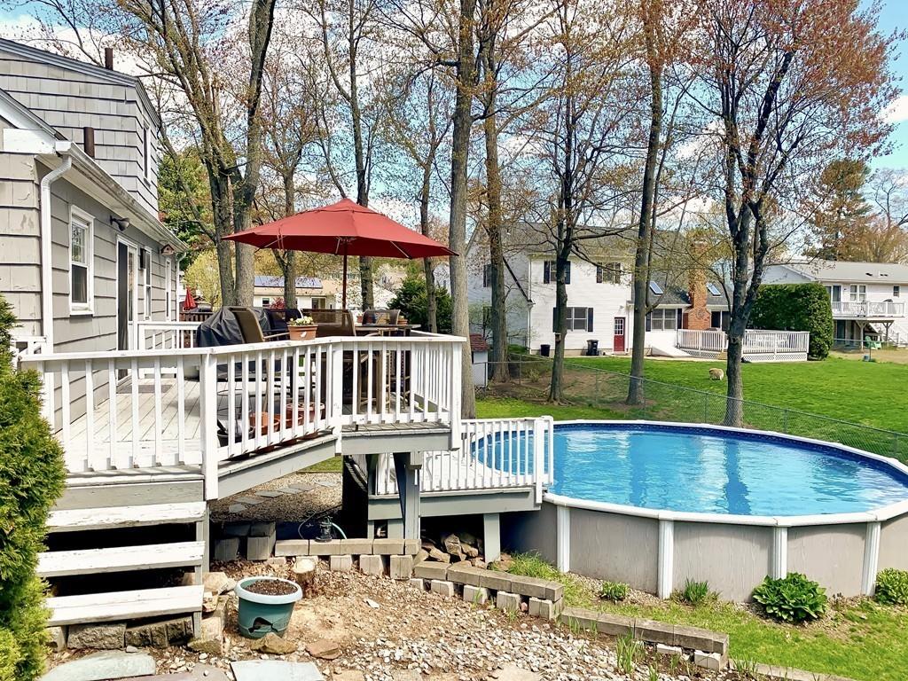 411 Dwight Road East Longmeadow, MA 01028 - Photo 3 of 34 a view of a house with a deck