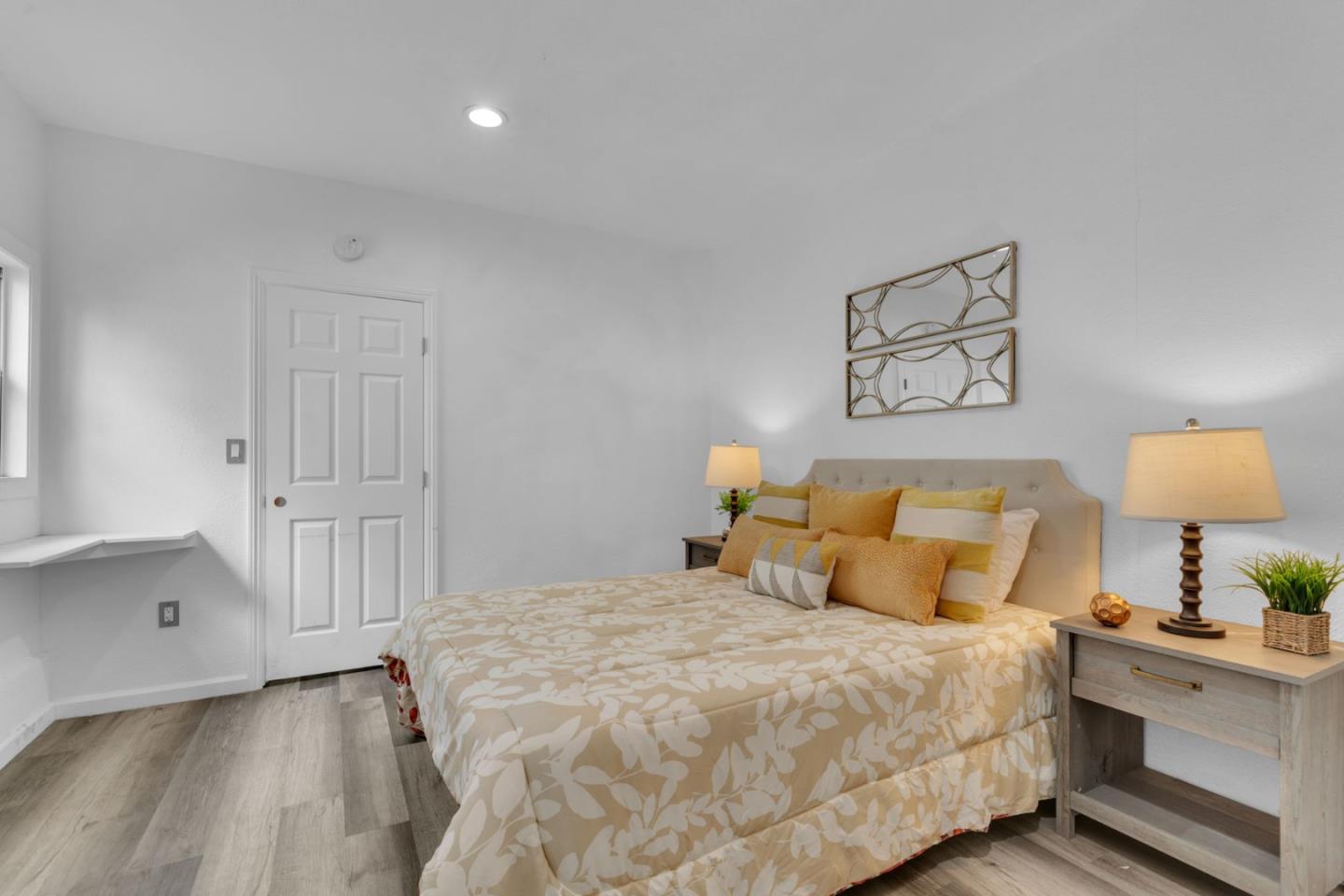 809 Modoc Street Vallejo, CA 94591 - Photo 14 of 31 a bedroom with a bed and a lamp