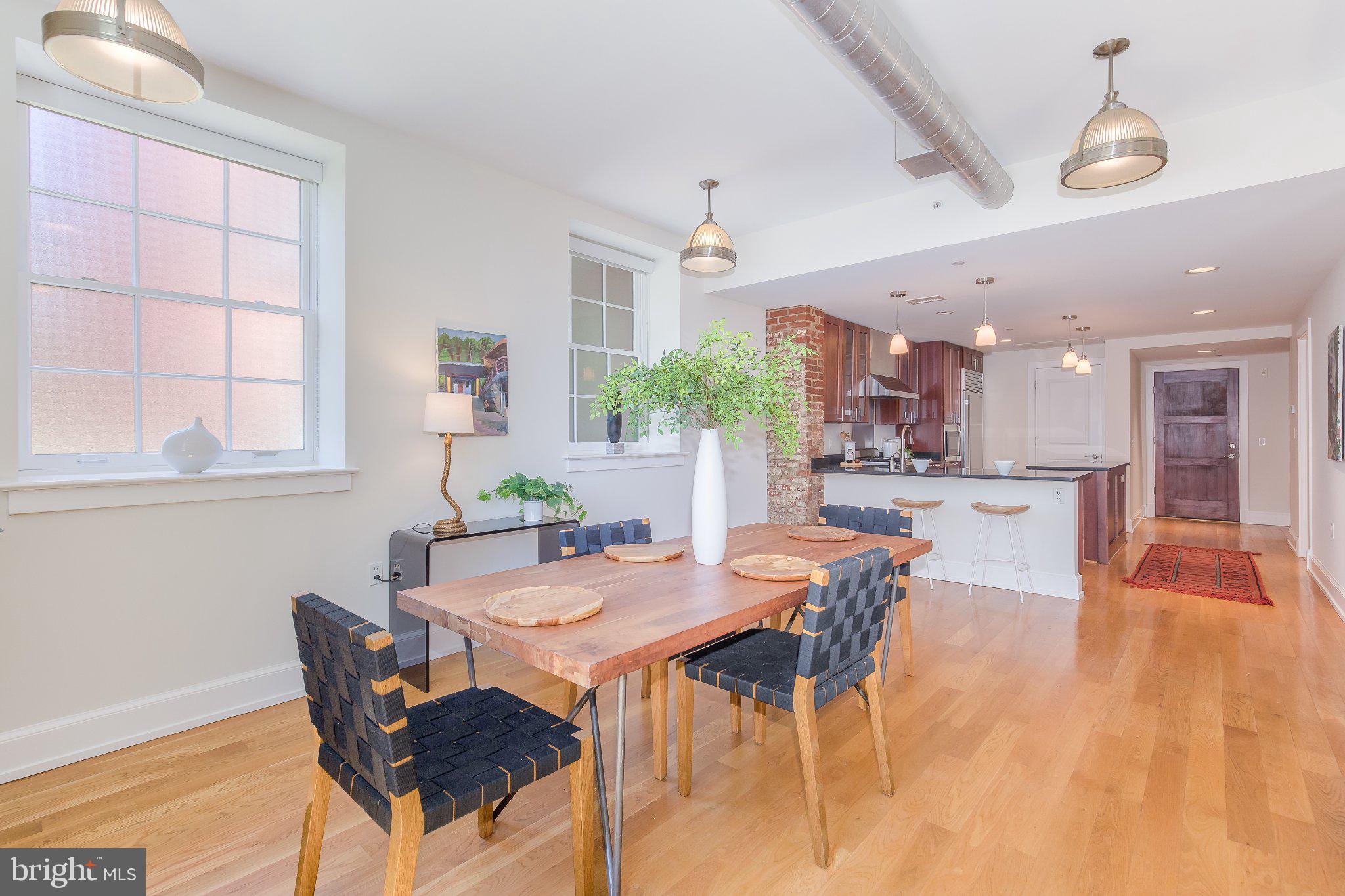 215 I Street Northeast, Unit 105 Washington, DC 20002 - Photo 14 of 41 a dining room with furniture and window