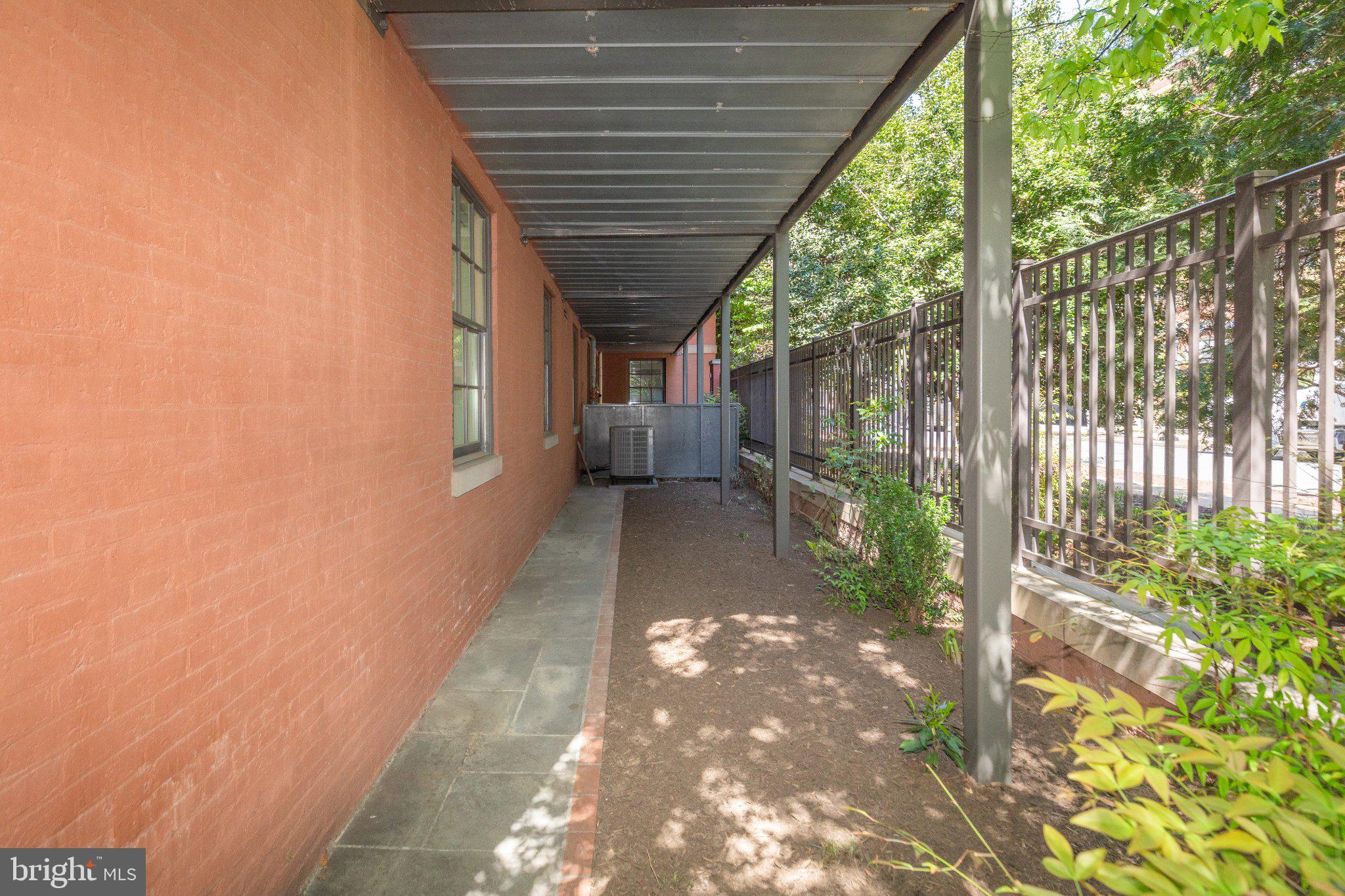 215 I Street Northeast, Unit 105 Washington, DC 20002 - Photo 35 of 41 a view of backyard with green space